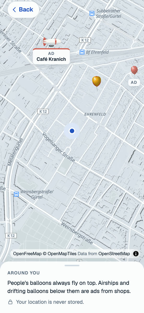 Map in the app with airships labelled as ads and a drifting balloon
